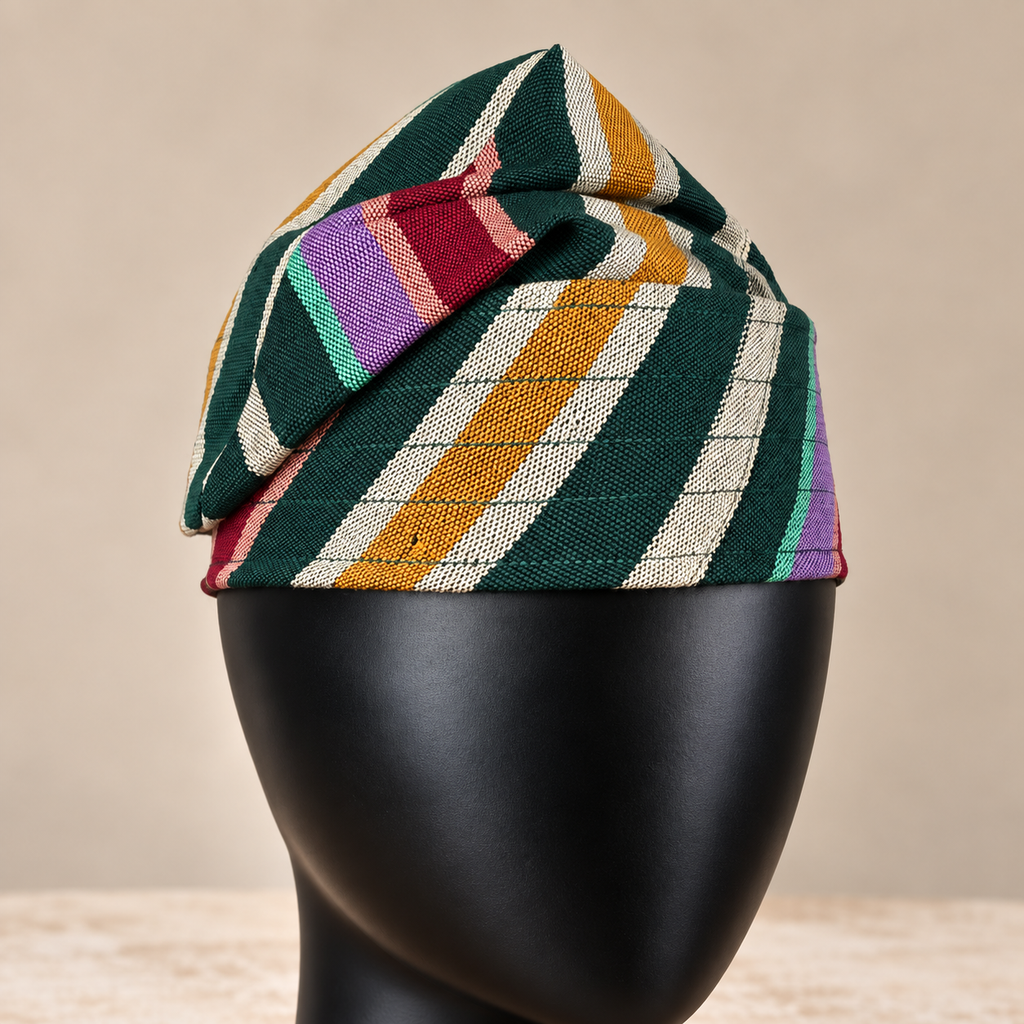 Multicoloured handmade Yoruba Fìlà cap, angled view