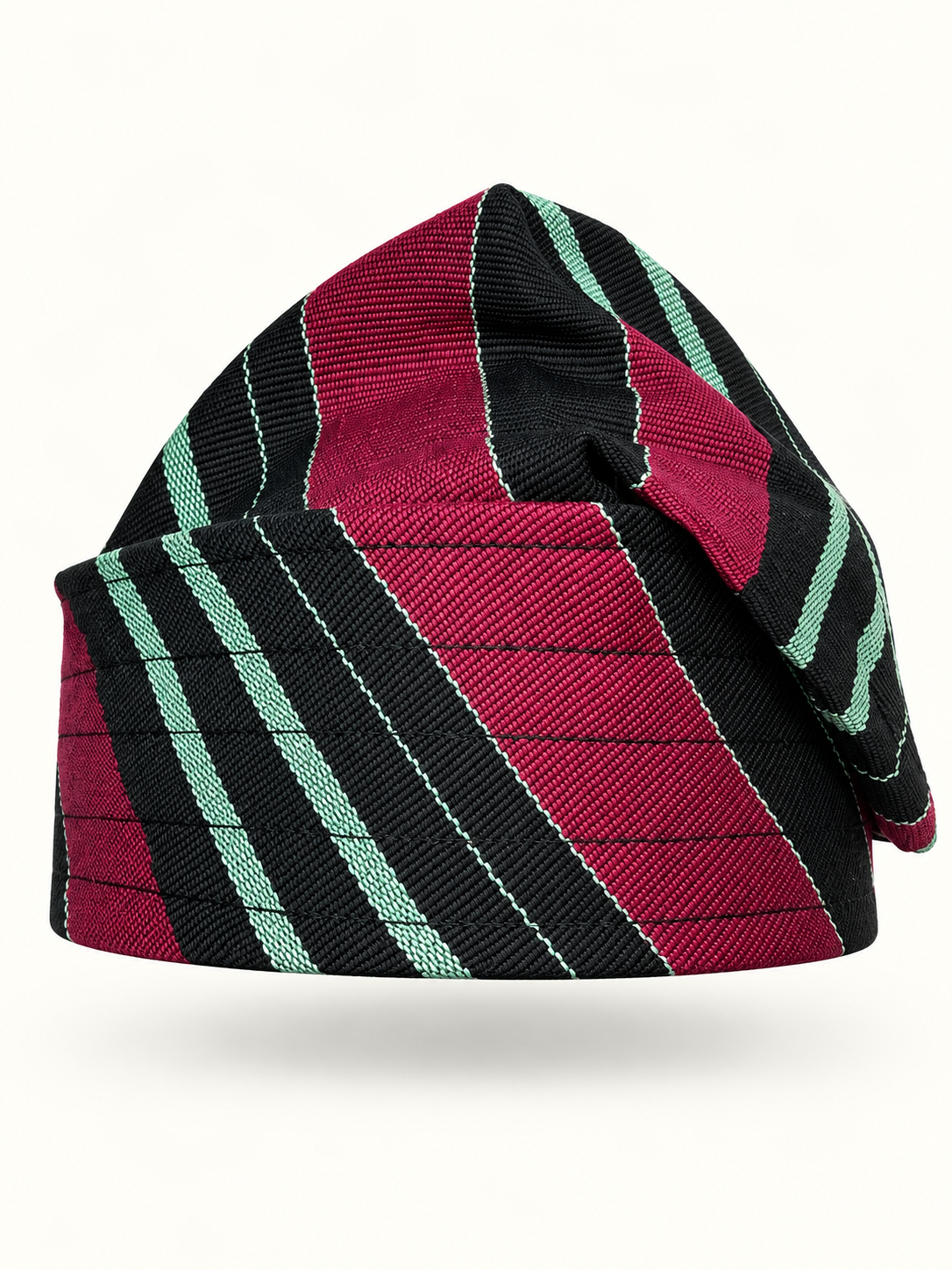 Multicoloured handmade Yoruba Fìlà cap on display