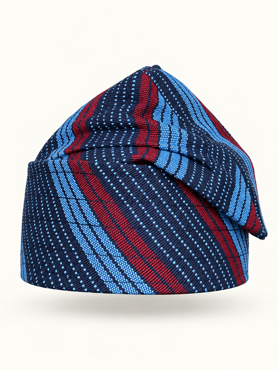 Blue handmade Yoruba Fìlà cap on display