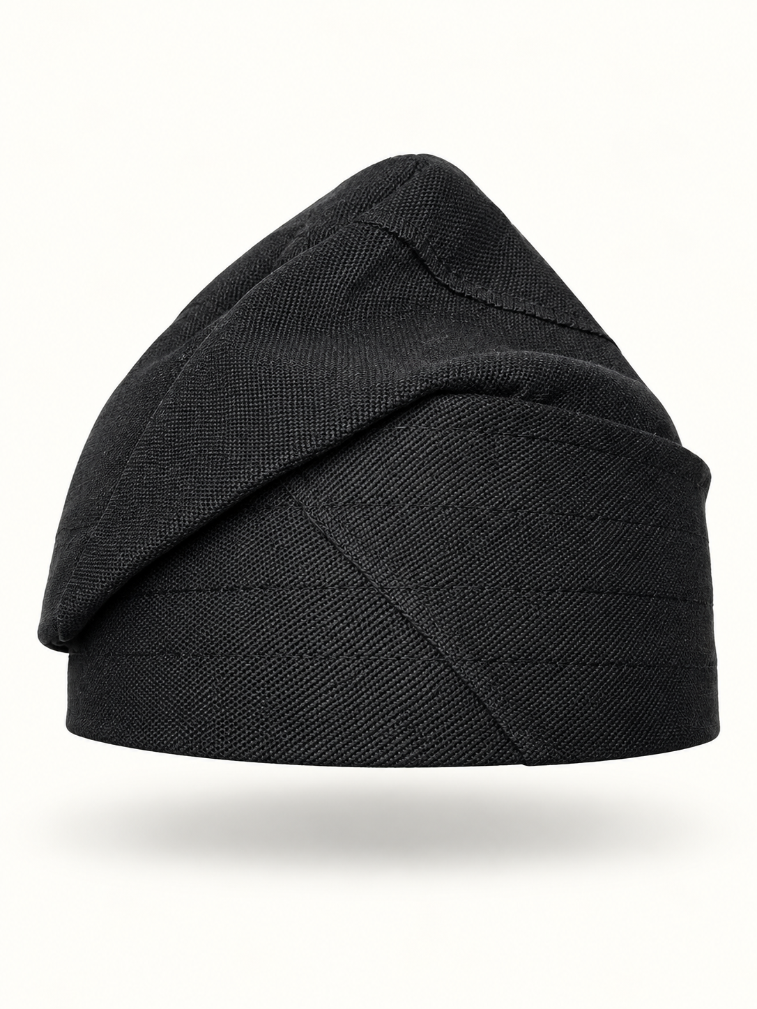 Black handmade Yoruba Fìlà cap on display