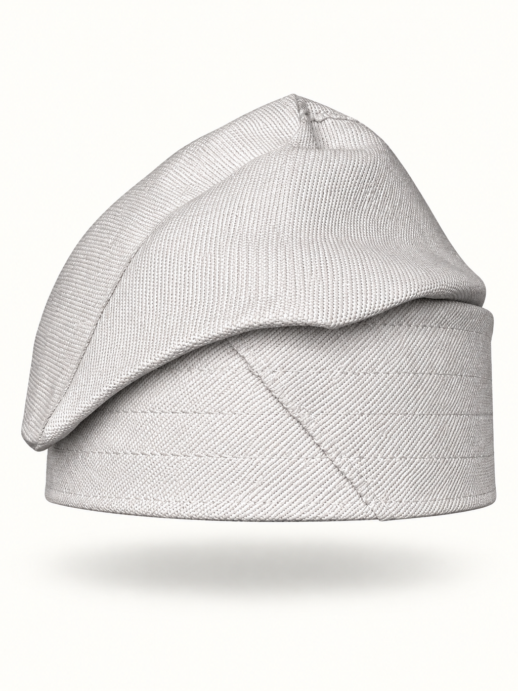 White handmade Yoruba Fìlà cap on display