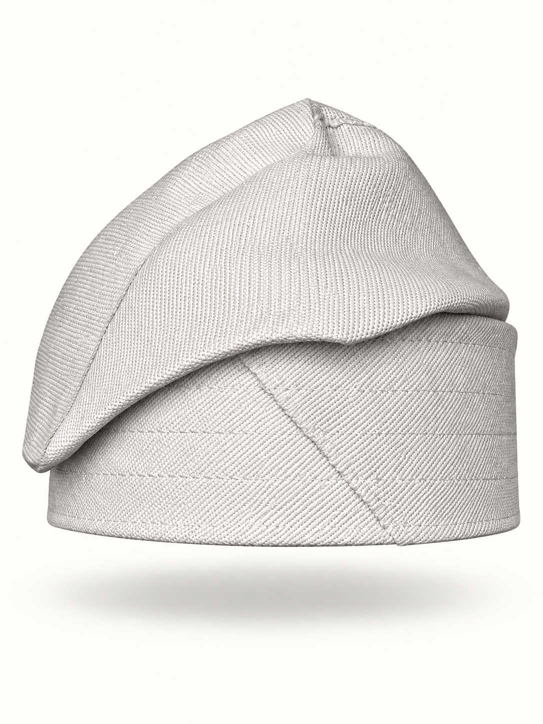 White handmade Yoruba Fìlà cap on display
