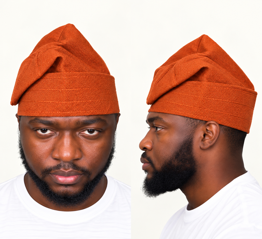 Model wearing a orange handmade Yoruba Fìlà cap
